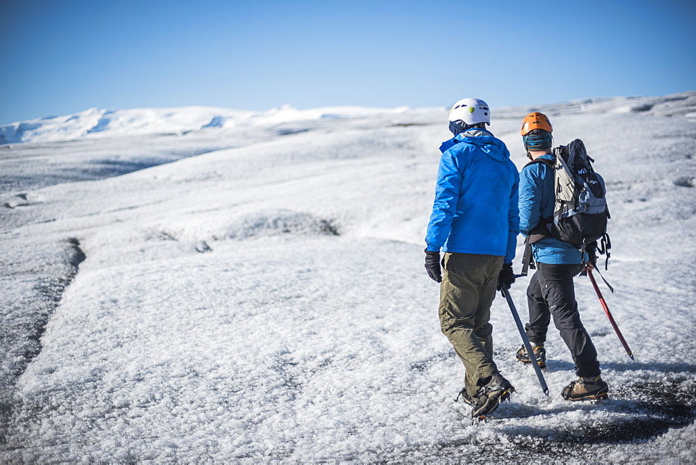 Tourists walking on Breidamerkurjokull Glacier, Vatnajokull Ice Cap, Iceland, Polar Regions