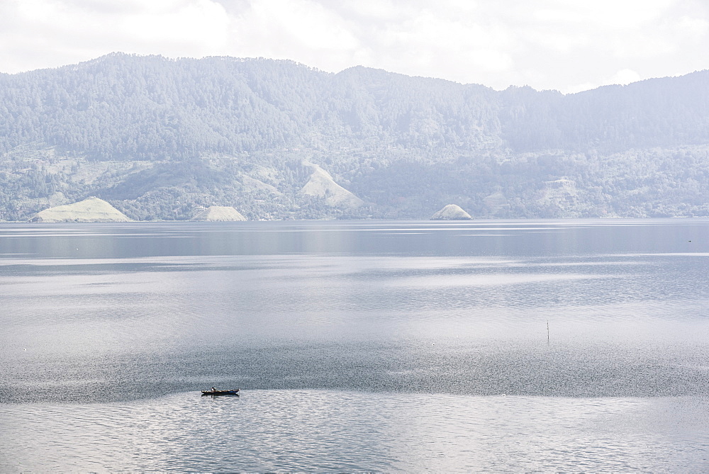 Fishing boat on Lake Toba (Danau Toba), the largest volcanic lake in the world, North Sumatra, Indonesia, Southeast Asia, Asia