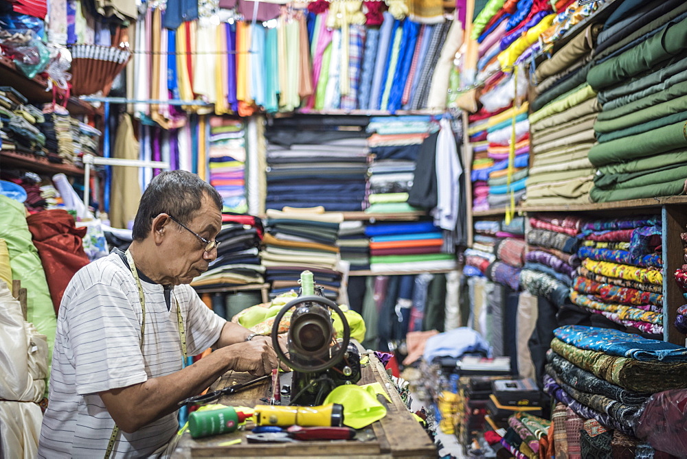 Man sewing in Sabang Market, Pulau Weh Island, Aceh Province, Sumatra, Indonesia, Southeast Asia, Asia