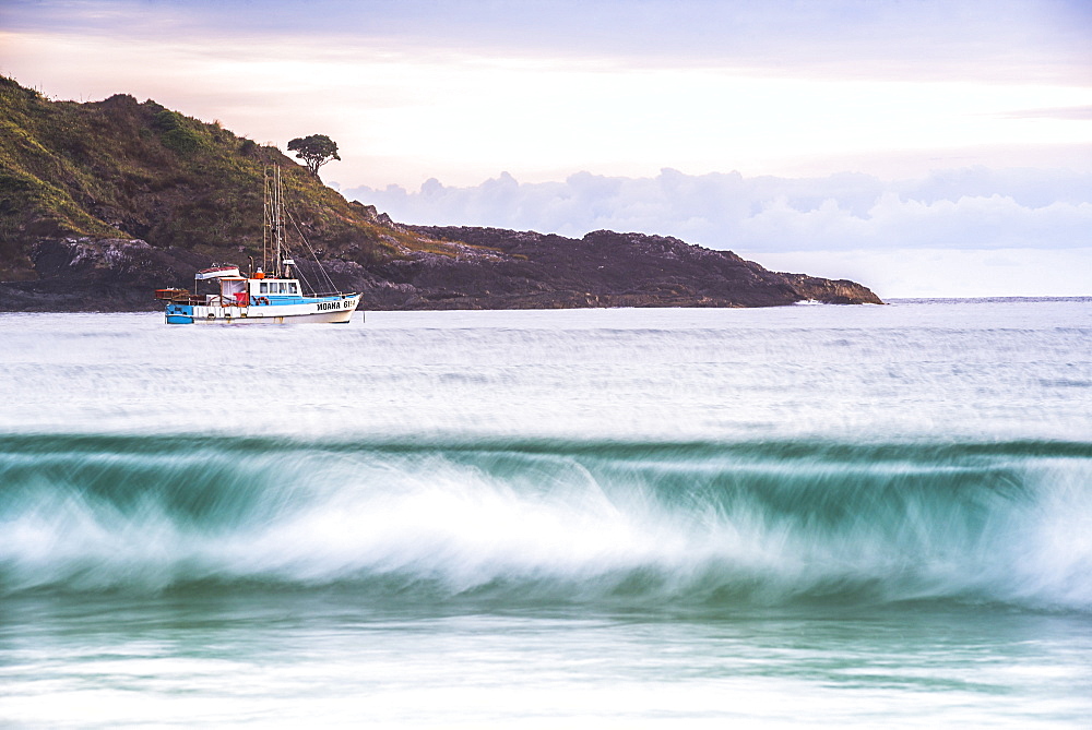 Fishing boat in Maitai Bay (Matai Bay) Beach on the Karikari Peninsula, Northland, New Zealand, Pacific