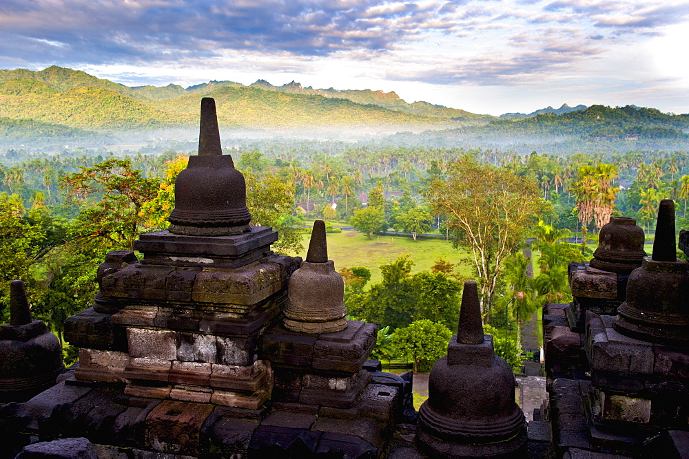 Stone Stupa at Borobodur on a misty morning at sunrise, Borobudur (Borobodur), UNESCO World Heritage Site, Yogyakarta, Java, Indonesia, Southeast Asia, Asia