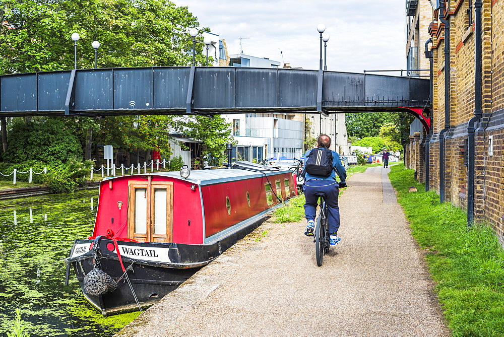 Cycling by the Canal at Ladbroke Grove in the Royal Borough of Kensington and Chelsea, London, England, United Kingdom, Europe