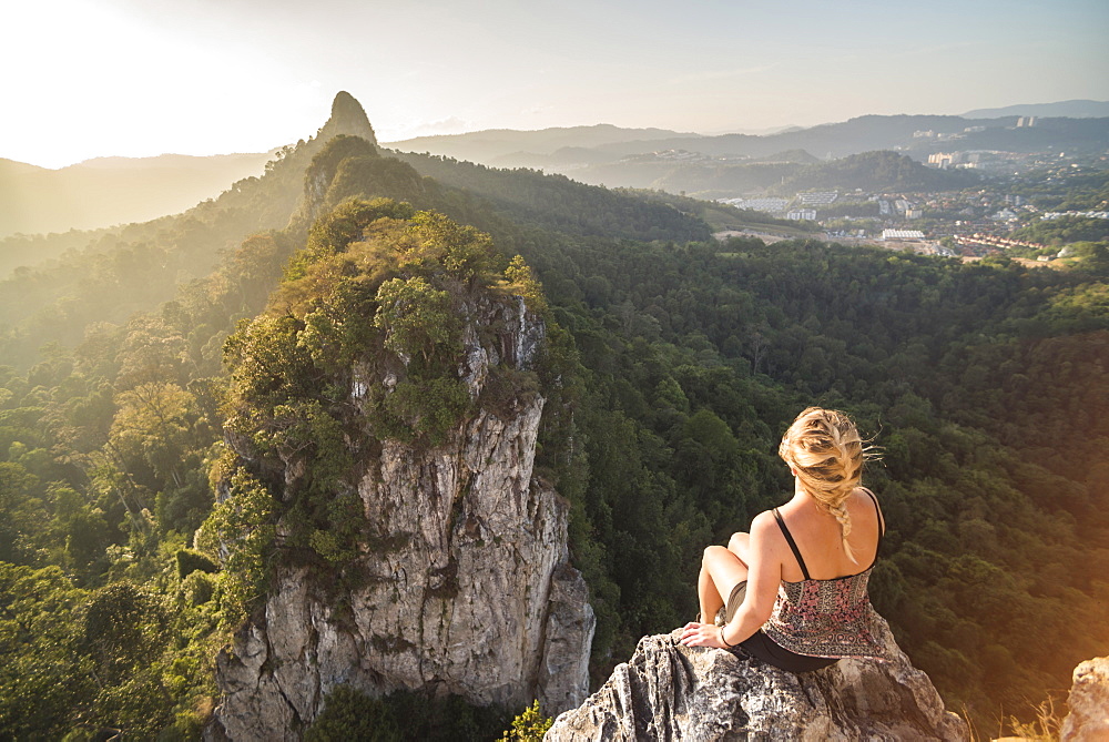 Tourist on Bukit Tabur Mountain at sunrise, Kuala Lumpur, Malaysia, Southeast Asia, Asia