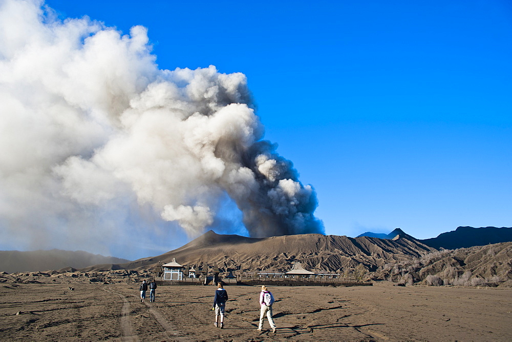 Tourists watching Mount Bromo volcanic eruption, East Java, Indonesia, Southeast Asia, Asia