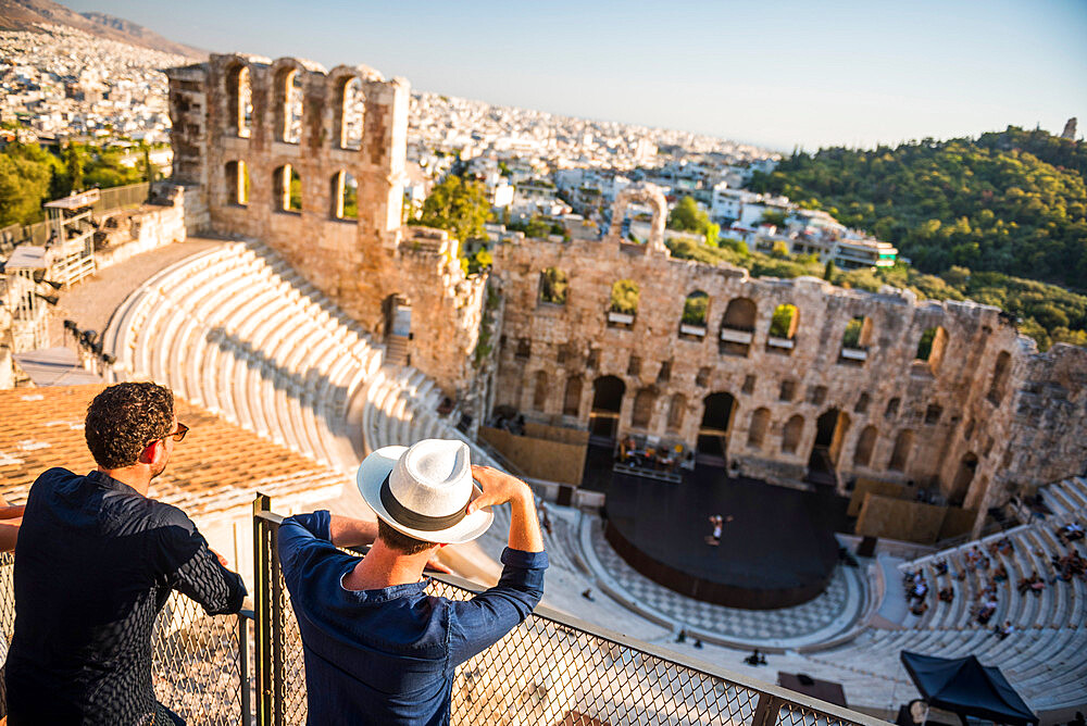 Tourists at Odeon of Herodes Atticus Theatre, by the Acropolis, UNESCO World Heritage Site, Athens, Attica Region, Greece, Europe