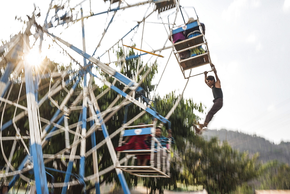 Hand operated ferris wheel at Pindaya Cave Festival, Shan State, Myanmar (Burma), Asia