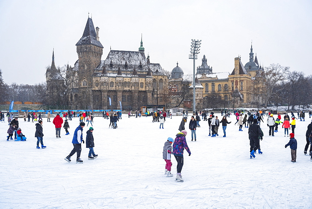 Budapest Outdoor Ice Rink in Varosliget with Vajdahunyad Castle in the background, Budapest, Hungary, Europe