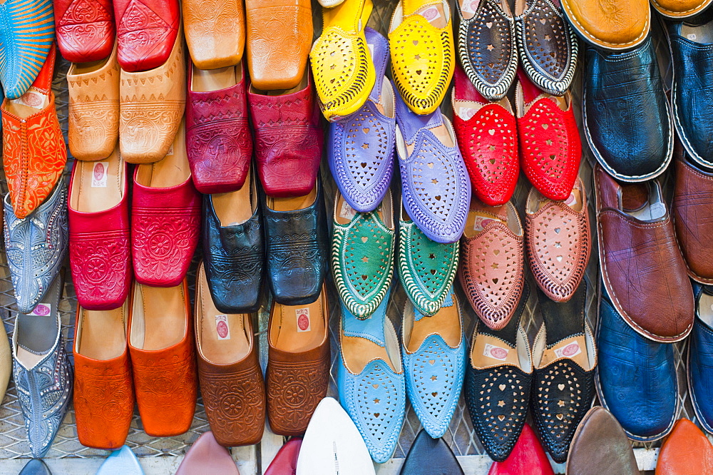 Colourful babouche (mens leather slippers) for sale in the Marrakech souks, Place Djemaa El Fna, Marrakech, Morocco, North Africa, Africa 