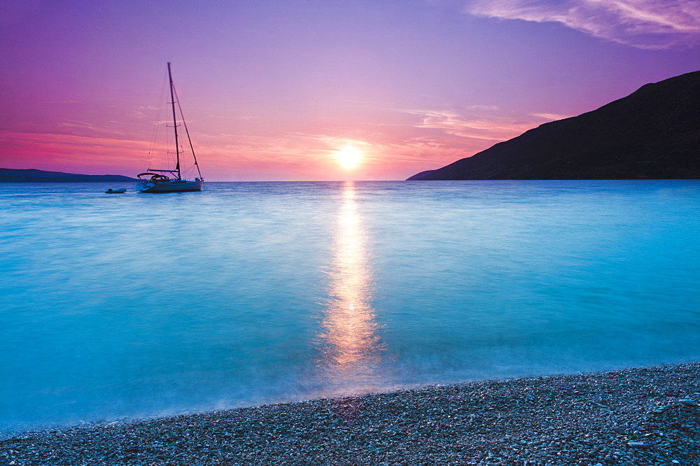 Adriatic Sea off Zlatni Rat Beach at sunset, Bol, Brac Island, Dalmatian Coast, Croatia, Europe