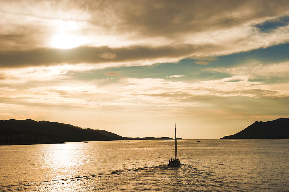 Sailing boat at sunset on the Dalmatian Coast, Adriatic, Croatia, Europe 