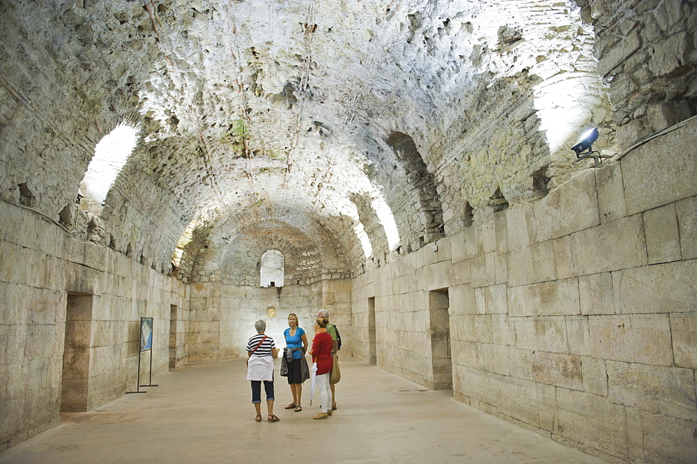 Tourists exploring the underground halls at Diocletian's Palace, UNESCO World Heritage Site, Split, Croatia, Europe