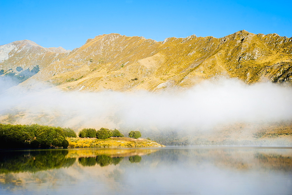 Misty dawn reflections at Lake Moke, Queenstown, Otago, South Island, New Zealand, Pacific 