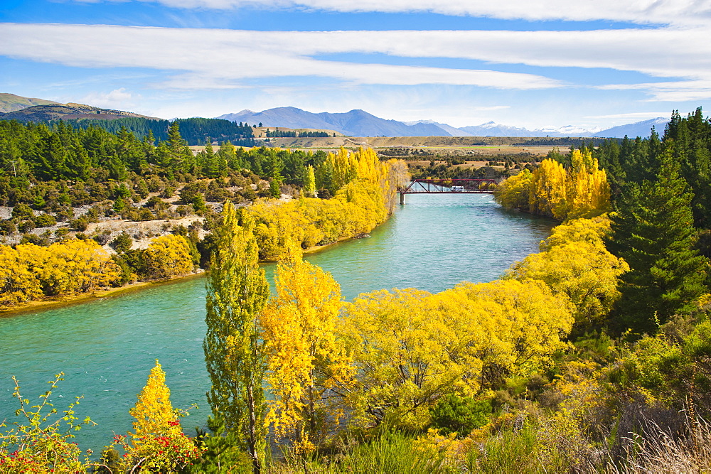 Caravan crossing a bridge on the Clutha River in autumn, Wanaka, South Island, New Zealand, Pacific 