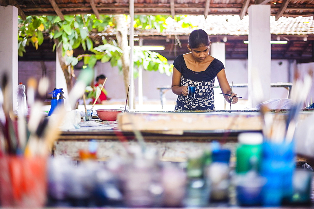 Sri Lankan woman batik painting near Anuradhapura, Central Province, Sri Lanka, Asia 