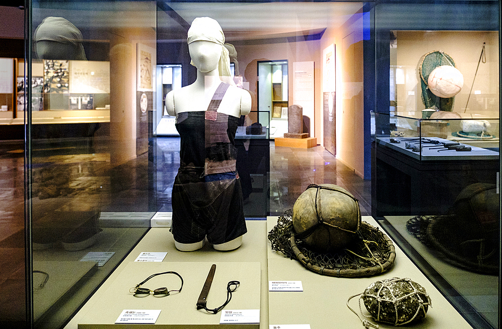 Jeju's Haenyeo Museum showcases clothes and items used when Jeju women first took to the ocean to source seafood for their families, Jeju, South Korea, Asia