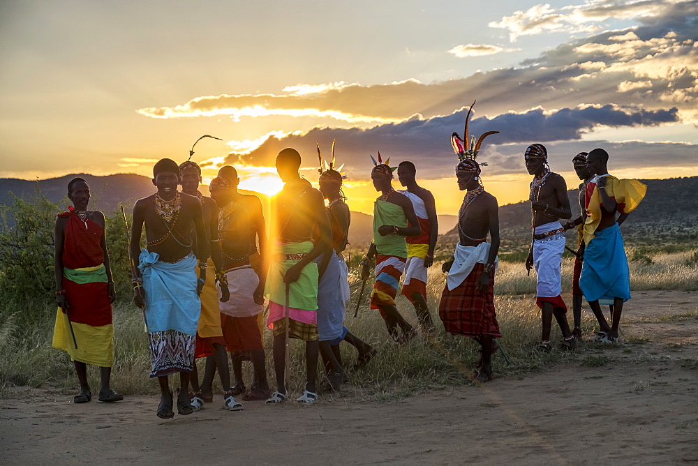 Portrait of Samburu tribe members dancing the traditional wedding dance at dusk, Kenya, East Africa, Africa