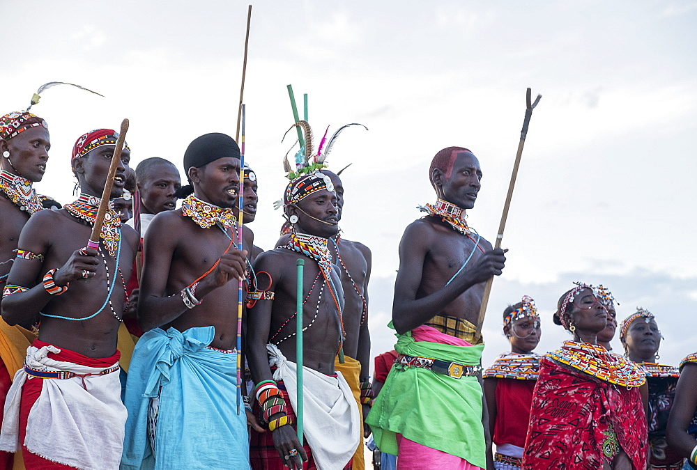 Portrait of Samburu tribe members dancing the traditional wedding dance at dusk, Kenya, East Africa, Africa