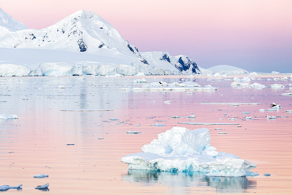 Sunset over icebergs in the Gerlache Strait, Antarctica, Southern Ocean, Polar Regions