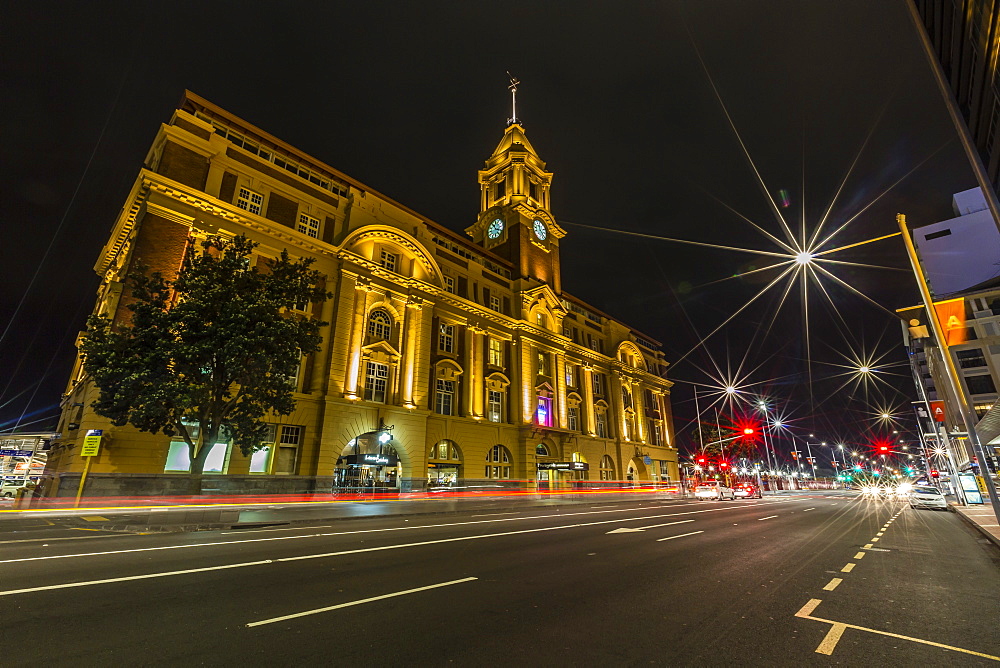 Night view of the Britomart Transport Centre in the city of Auckland from Auckland Harbour, North Island, New Zealand, Pacific