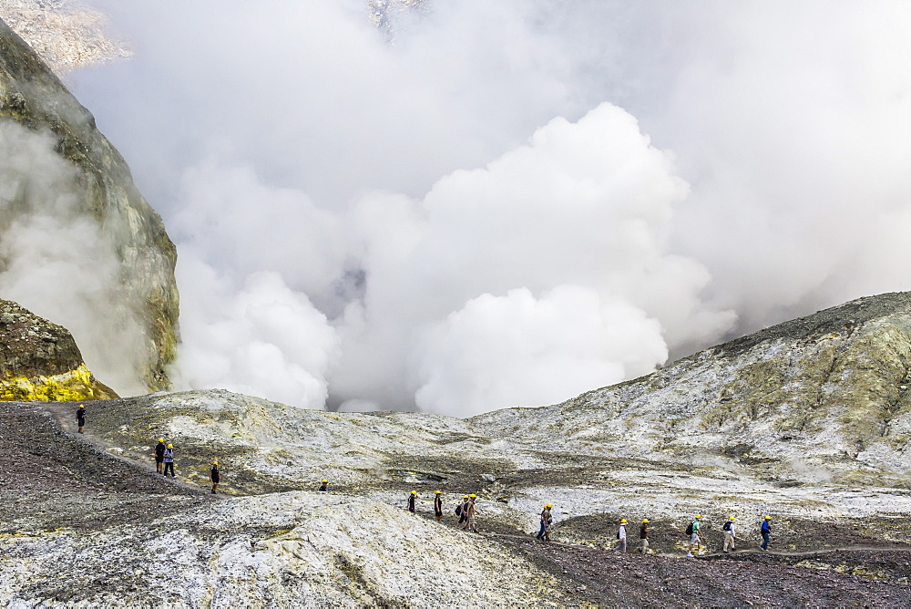 Visitors at an active andesite stratovolcano on White Island, North Island, New Zealand, Pacific