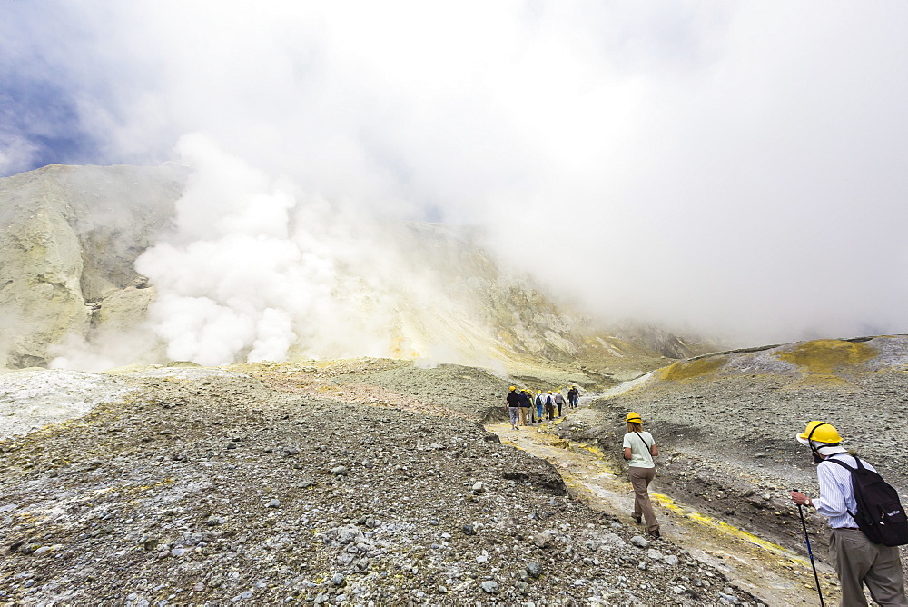 Visitors at an active andesite stratovolcano on White Island, North Island, New Zealand