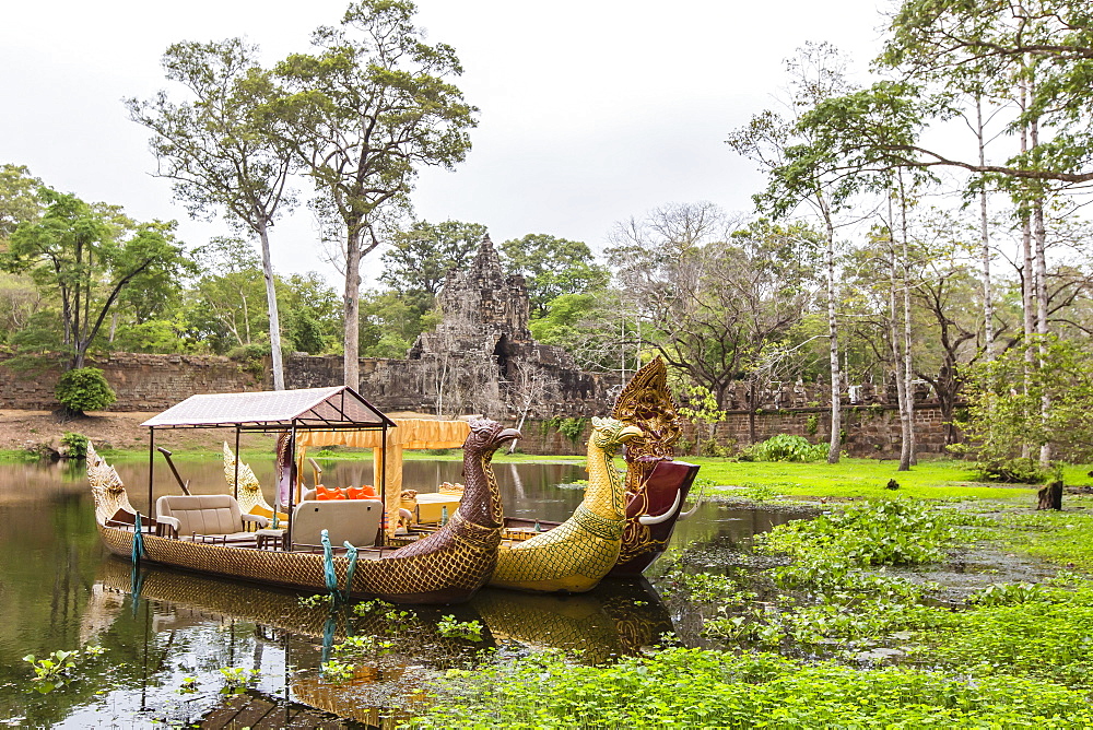 Ornate tourist boats near the South Gate at Angkor Thom, Angkor, UNESCO World Heritage Site, Siem Reap Province, Cambodia, Indochina, Southeast Asia, Asia