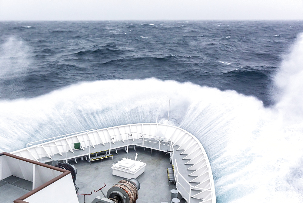 The Lindblad Expeditions ship National Geographic Explorer in heavy seas in the Drake Passage, Antarctica, Polar Regions