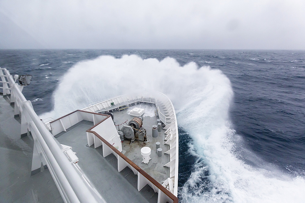 The Lindblad Expeditions ship National Geographic Explorer in heavy seas in the Drake Passage, Antarctica, Polar Regions