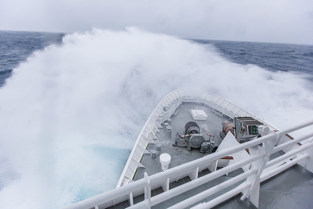 The Lindblad Expeditions ship National Geographic Explorer in heavy seas in the Drake Passage, Antarctica, Polar Regions