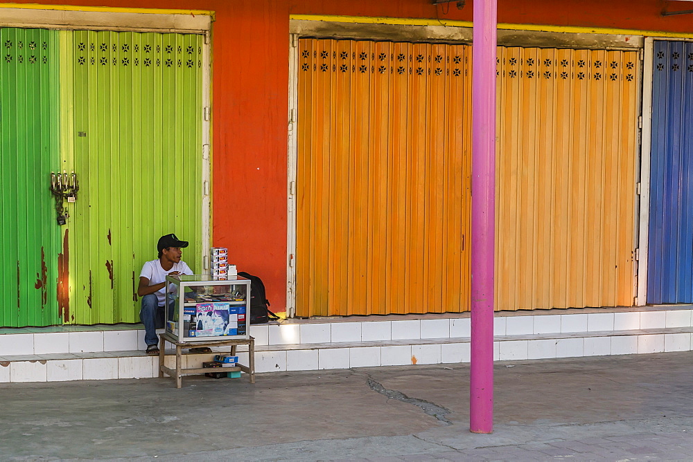 Man selling electronics from small cart in the capital city of Dili, East Timor, Southeast Asia, Asia