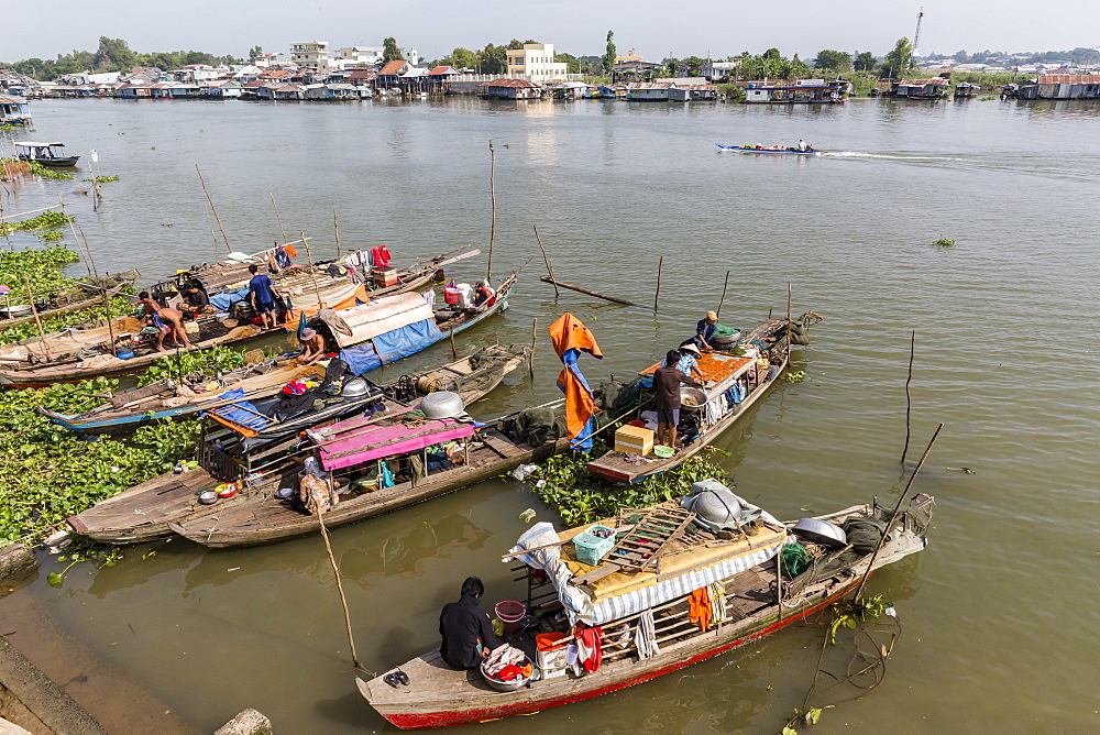 Families in their river boats at the local market in Chau Doc, Mekong River Delta, Vietnam, Indochina, Southeast Asia, Asia