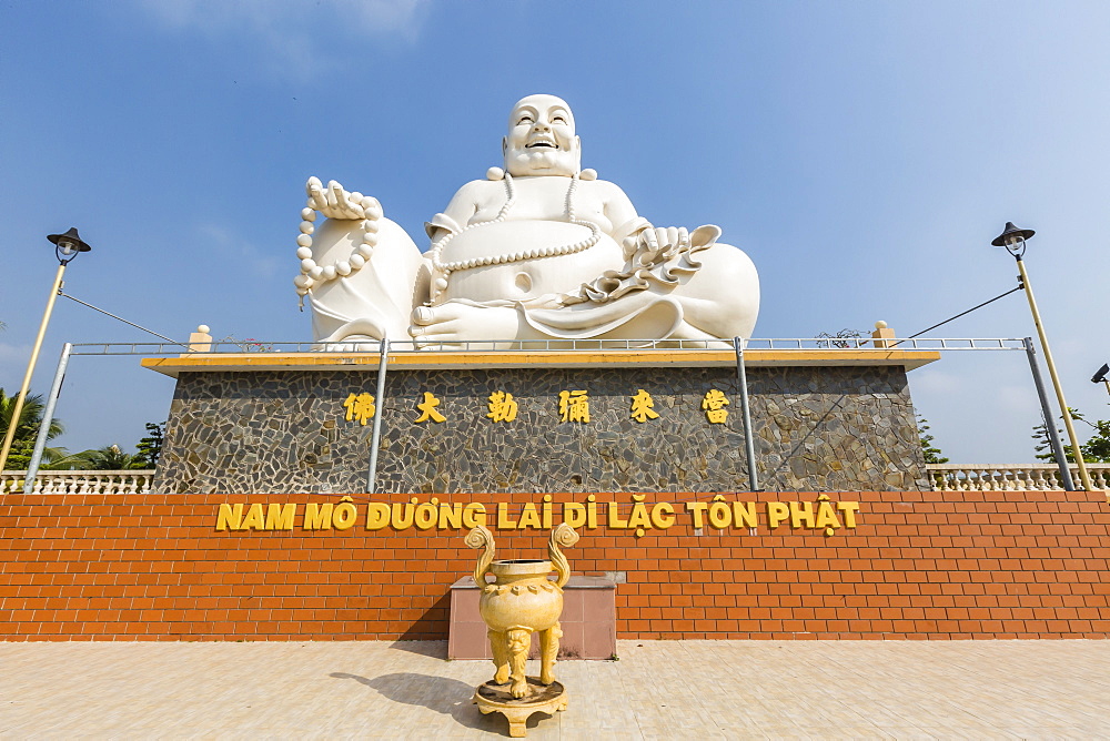 Giant Buddha statue at Vinh Trang Pagoda, My Tho, Vietnam, Indochina, Southeast Asia, Asia