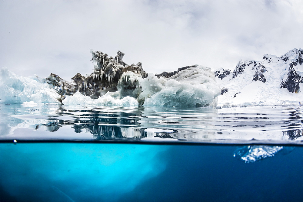 Above and below water view of iceberg at Booth Island, Antarctica, Polar Regions