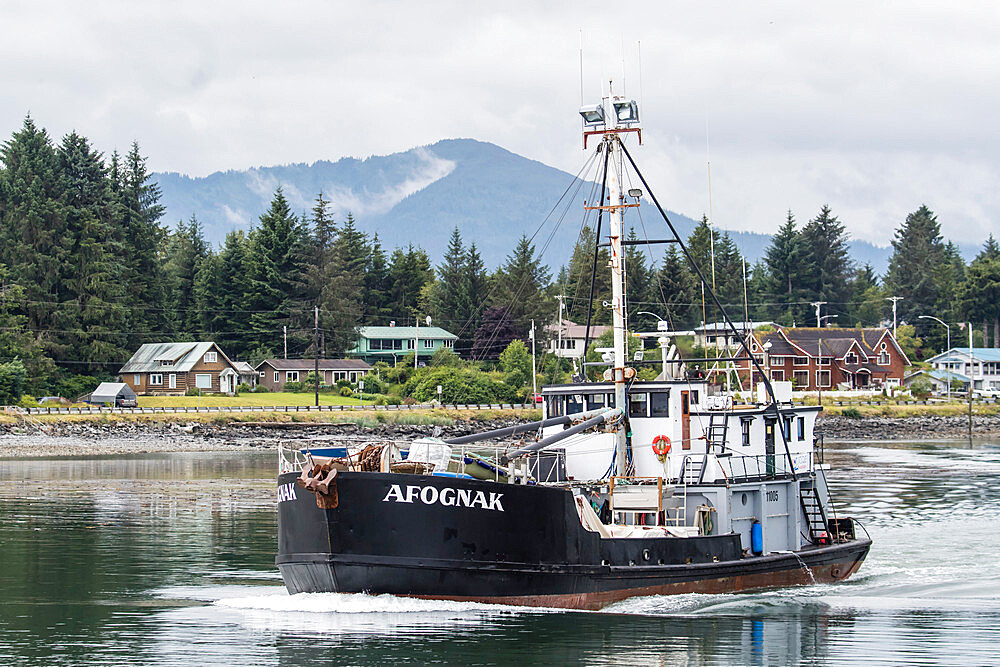 Fishing boat headed to sea in Petersburg, southeast Alaska, United States of America, North America