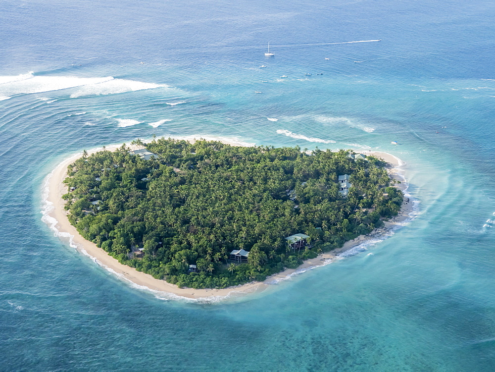 Aerial view of the heart-shaped island of Tavarua, near Viti Levu, Republic of Fiji, South Pacific Islands, Pacific