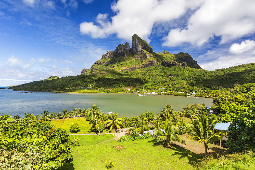 Palm lined inner lagoon of Bora Bora, Society Islands, French Polynesia, South Pacific, Pacific