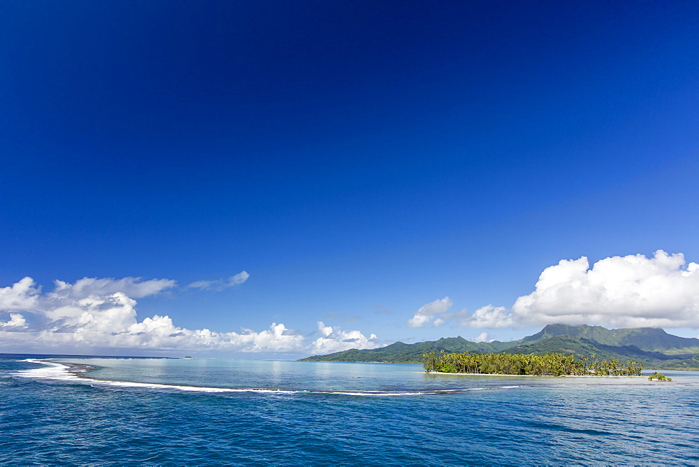 On approach to Raiatea through a break in the atoll reef, Society Islands, French Polynesia, South Pacific, Pacific