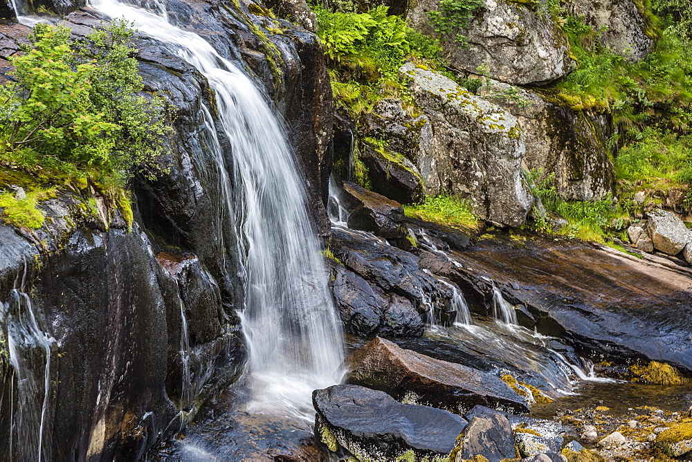 Slow shutter speed to create silky waterfall, Hellemoboten, Norway, Scandinavia, Europe 