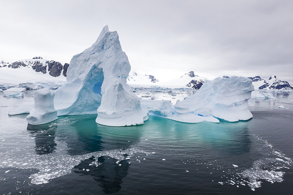 Huge arched iceberg in Neko Harbour, western side of the Antarctic Peninsula, Southern Ocean, Polar Regions