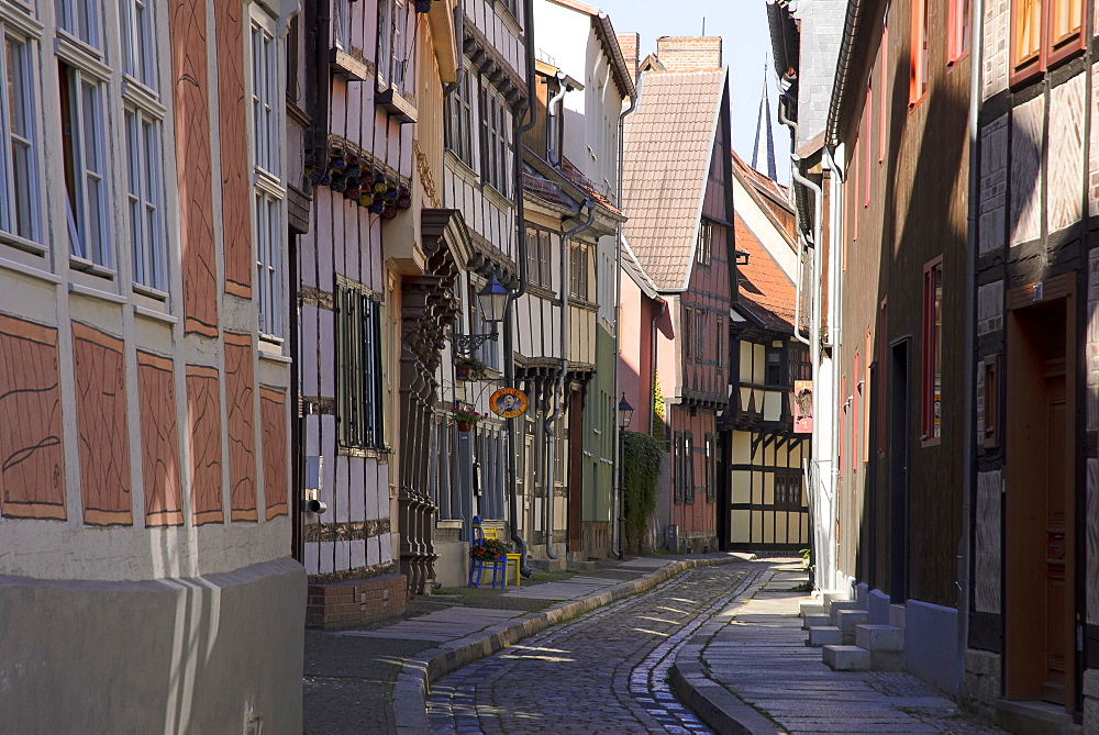 Half-timbered houses in an alley in the historic town of Quedlinburg, Harz, Saxony-Anhalt, Germany, Europe