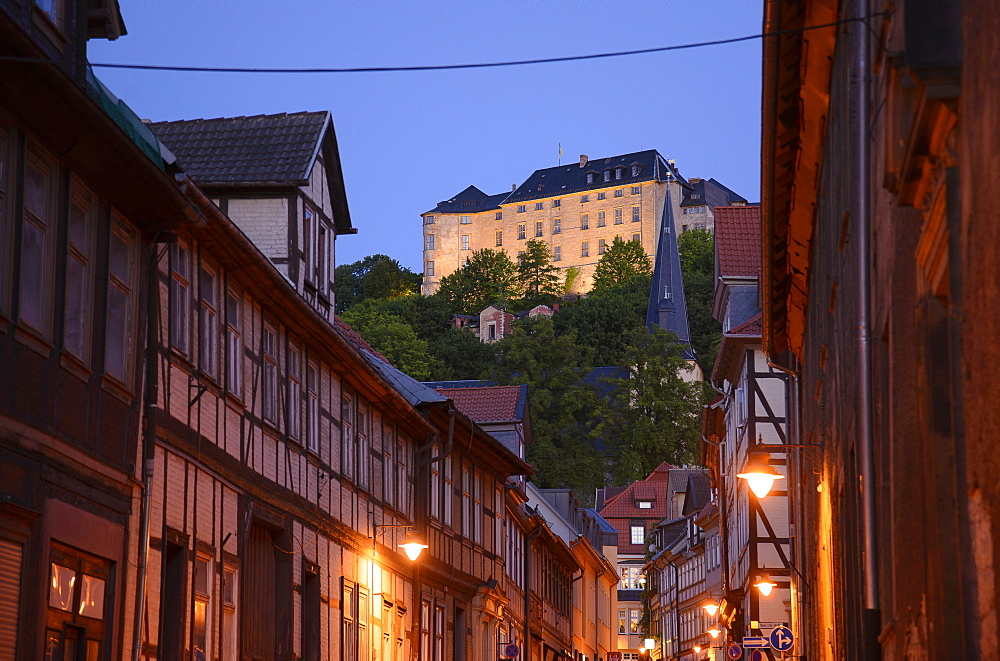 Alley with timbered houses and view to castle, Blankenburg, Harz, Saxony-Anhalt, Germany, Europe