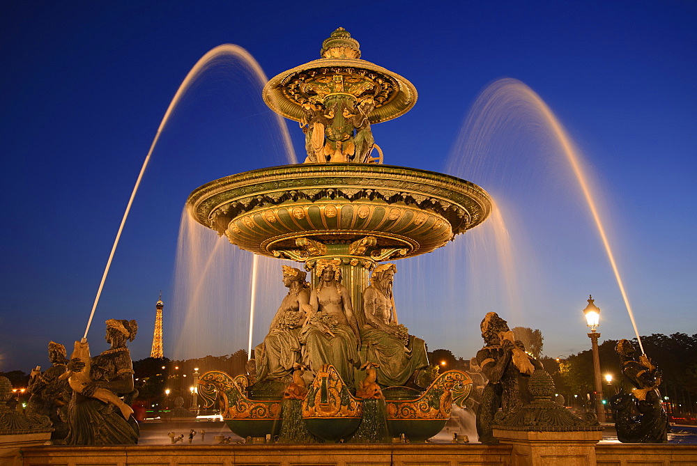 Place de la Concorde with fountain at night, Paris, France, Europe