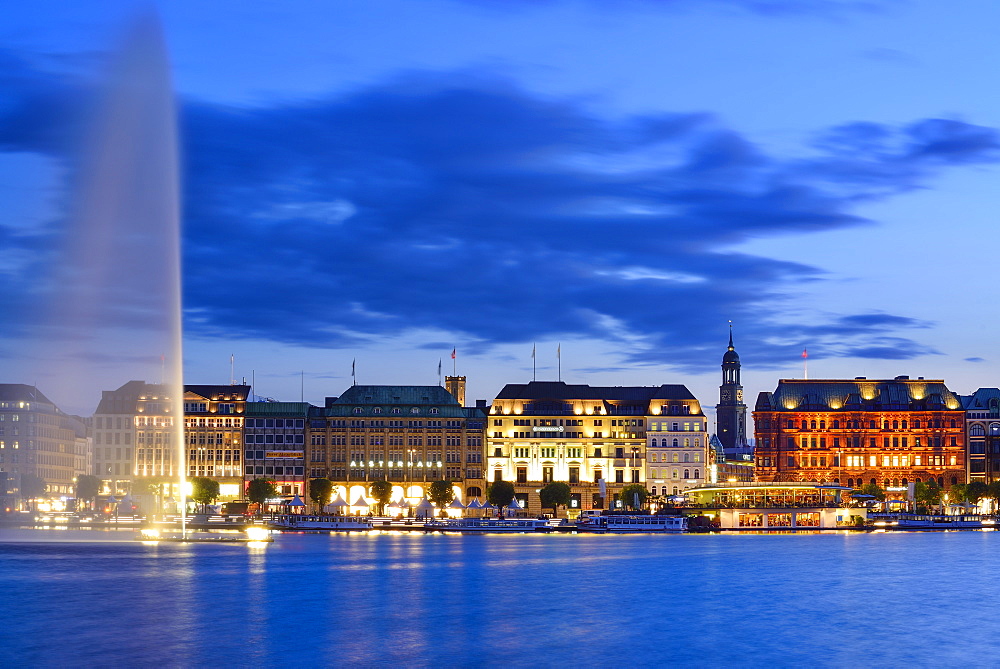 Binnenalster at night with fountain and illuminated church St. Michaelis, Binnenalster, Hamburg, Germany