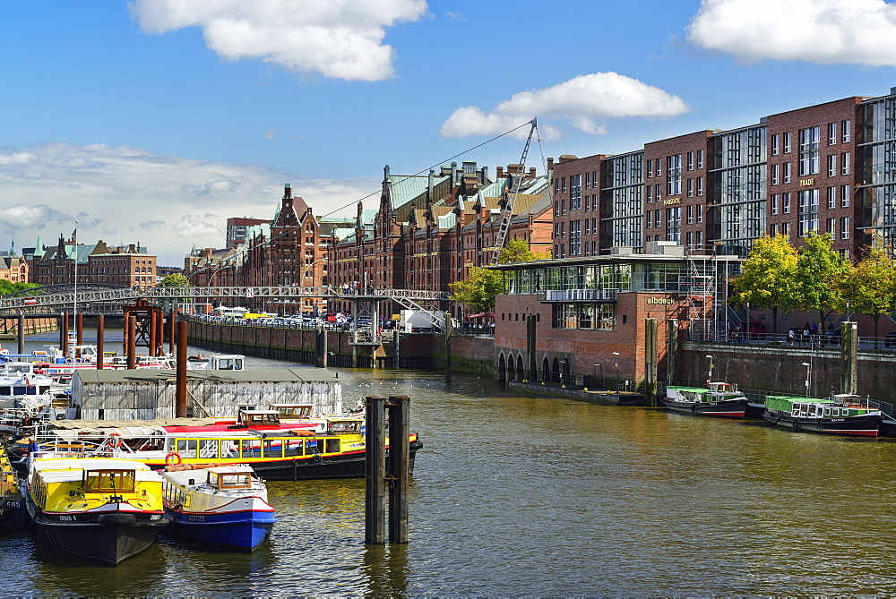 Ships in inland port with old and modern buildings of the old Warehouse district, Warehouse district, Speicherstadt, Hamburg, Ge