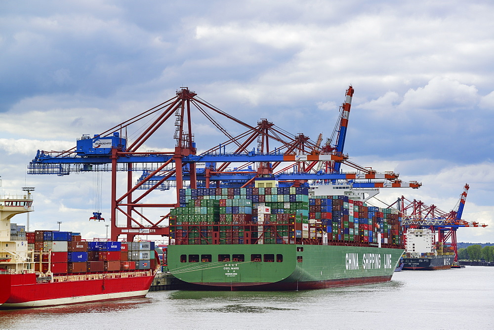 Container ships at container terminal Burchardkai, Waltershof, Hamburg, Germany