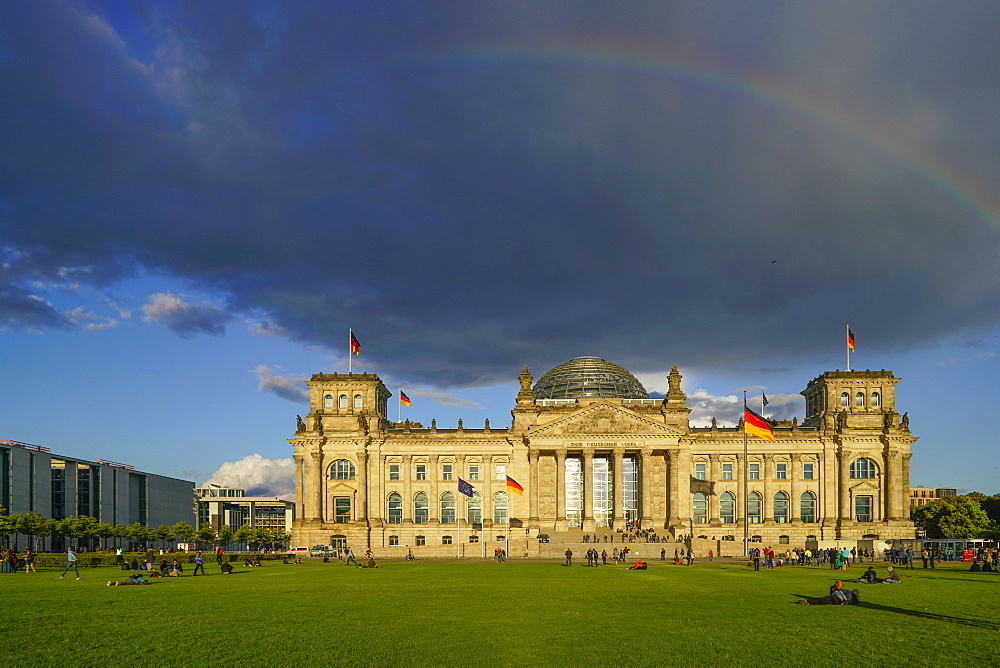 Rainbow and storm clouds above the Reichstag building, Berlin, Germany