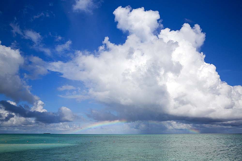 Rainbow above seawater at Meeru Island Resort, Meerufenfushi, North-Male-Atoll, Maldives