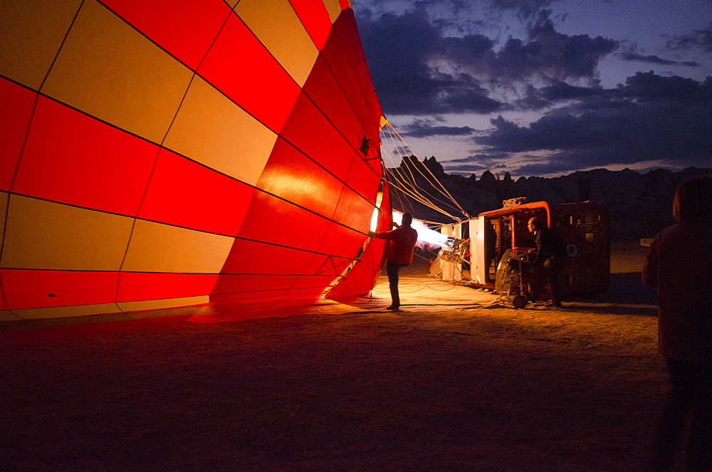 Balloon pilots at the break of dawn in Goereme, Cappadocia, Turkey