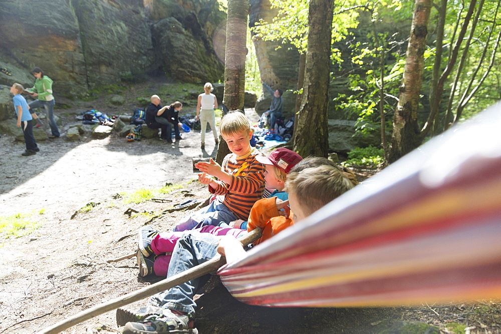 Children waiting in a hammock, climbing area, Saxony Switzerland, Hercules' Pillars, women, Elbe sandstone mountains, Dresden, Saxony, Germany, Europe