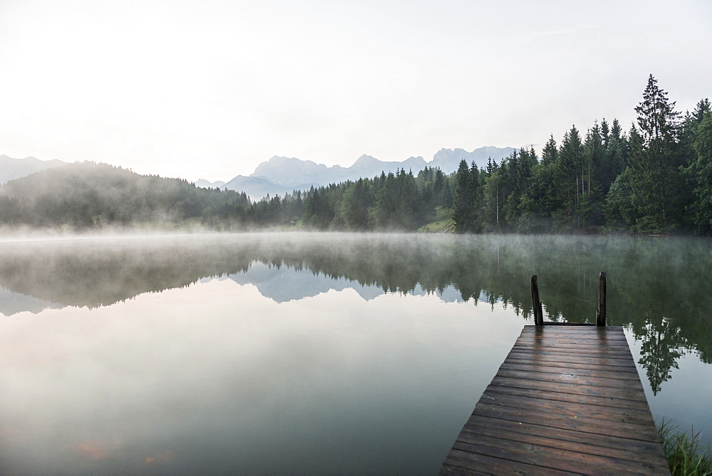 Lake Geroldsee with reflection, Wagenbruechsee, Kruen, near Garmisch-Partenkirchen, Upper Bavaria, Bavaria, Germany